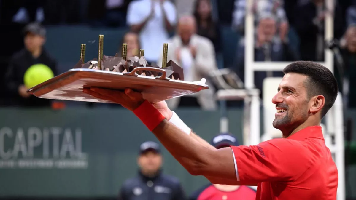 birthday boy novak djokovic lifted his birthday cake to the crowd after winning his first match at the geneva open photo afp birthday boy novak djokovic lifted his birthday cake to the crowd after winning his first match at the geneva open photo afp