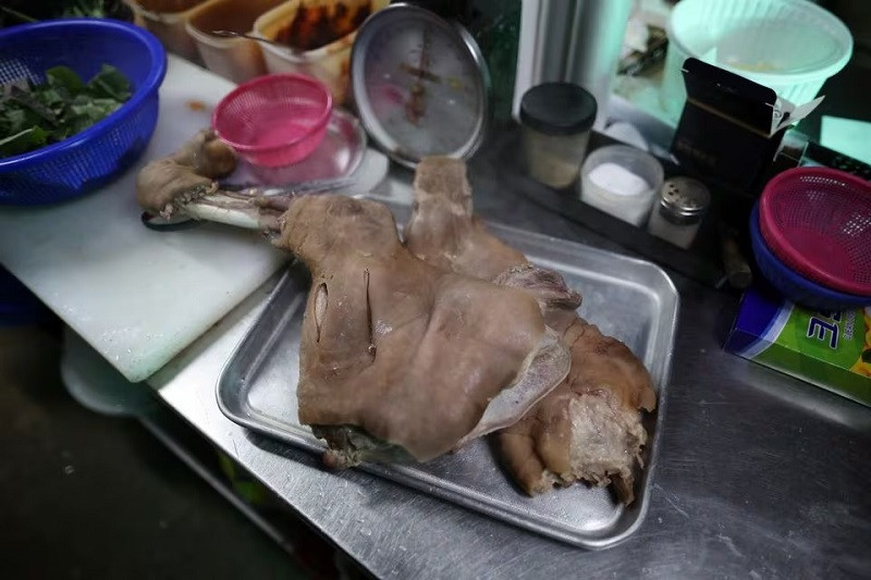 Boiled dog meat is pictured at a restaurant in Hwaseong, South Korea, November 21, 2023. PHOTO: REUTERS