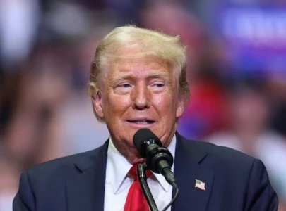 trump kisses woman behind life saving chart at pennsylvania rally