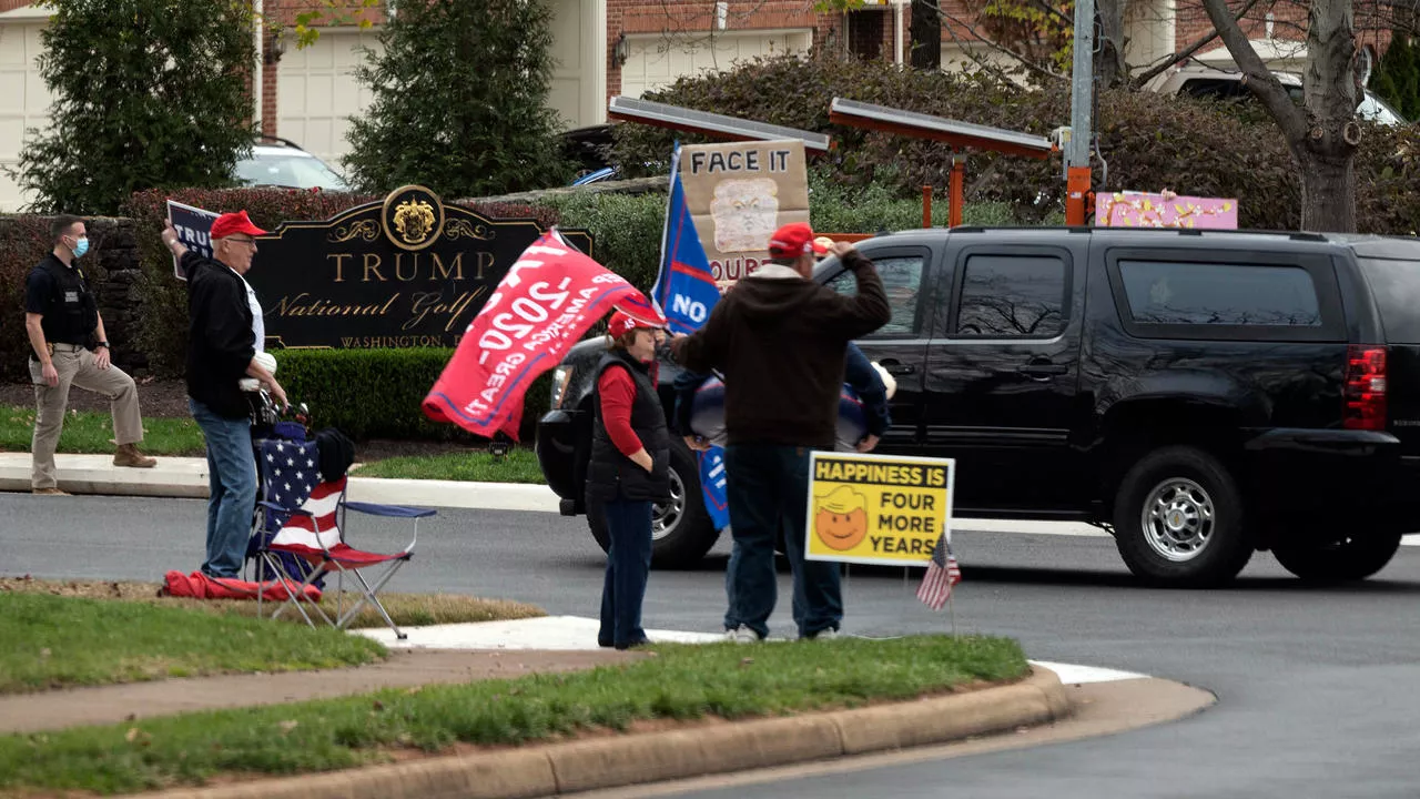 supporters of and protesters against outgoing president donald trump watch his motorcade pass into the trump international golf club in sterling virginia on saturday photo afp supporters of and protesters against outgoing president donald trump watch his motorcade pass into the trump international golf club in sterling virginia on saturday photo afp