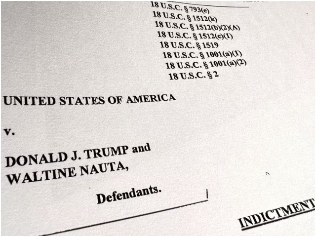 the first page of the u s justice department s charging document against former u s president donald trump and his employee waltine nauta charging trump with 37 criminal counts including charges of unauthorized retention of classified documents and conspiracy to obstruct justice after leaving the white house is seen after being released by the justice department in washington u s june 9 2023 photo reuters