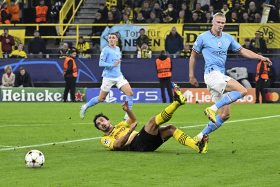 hummels keeps haaland quiet as dortmund reach ucl last 16