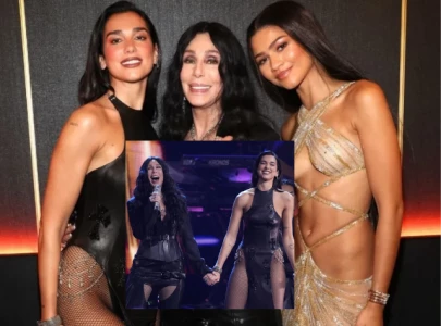 cher and dua lipa perform believe at rock roll hall of fame 2024 induction