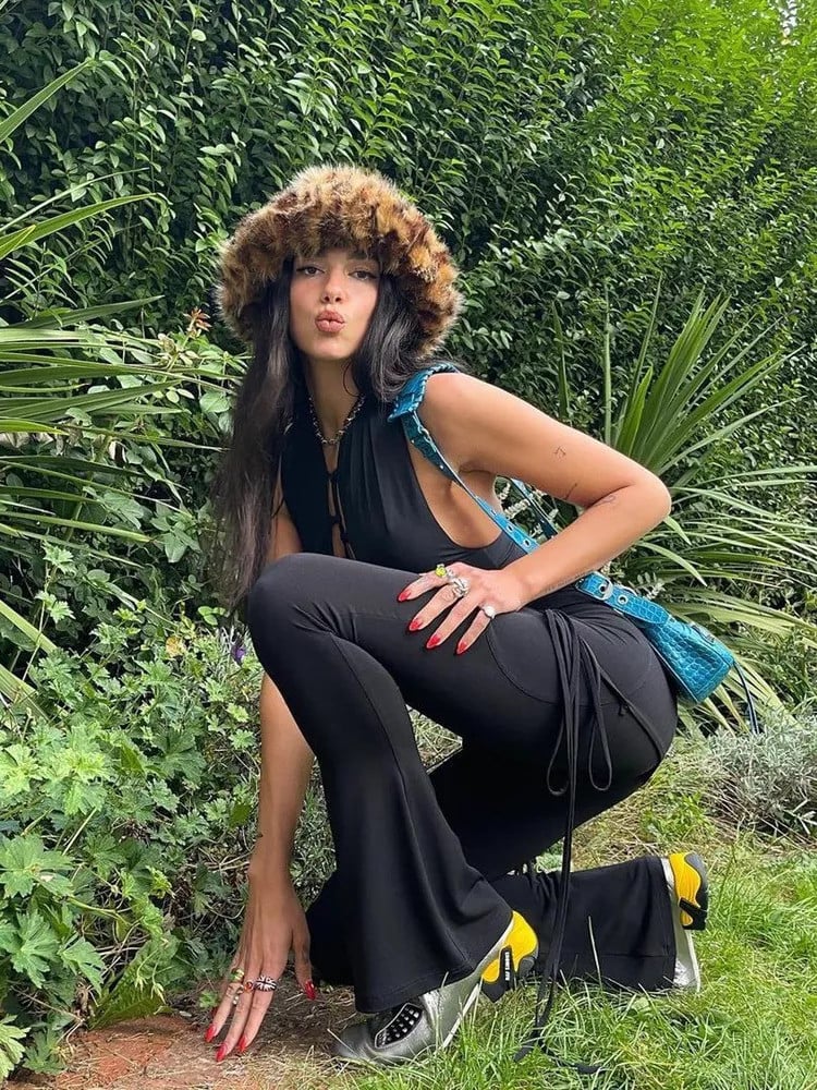 Dua Lipa wearing English brand 'Emma Brewin' faux fur bucket hat.