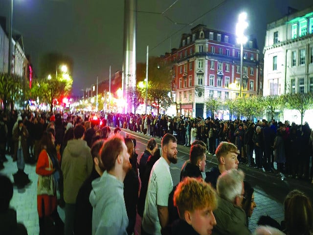 dublin police were dispatched to clear thousands in the streets photo file