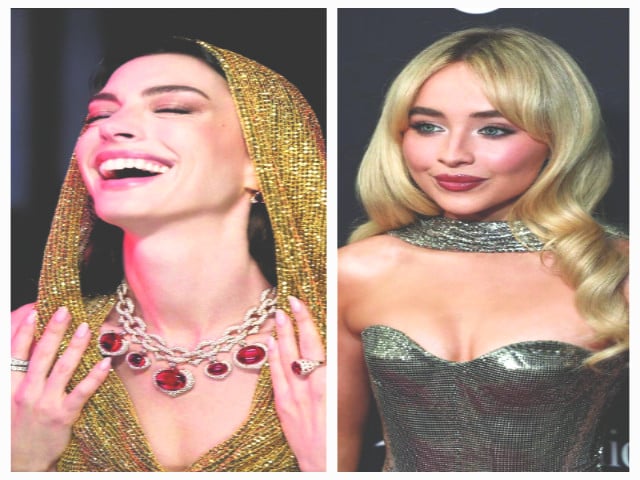 sabrina draped fabric around her neck while anne wore it over her head photo file