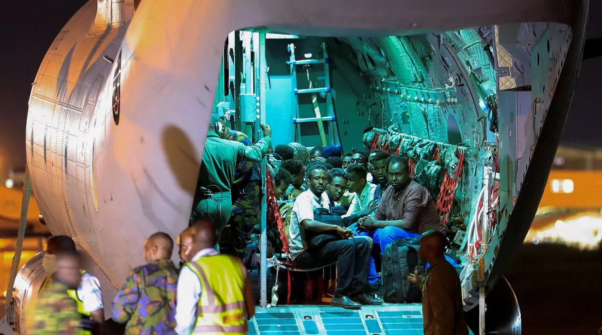 evacuees from war torn sudan sit inside a military plane as they wait to be processed by members of the kenya defence forces kdf upon their arrival at the jomo kenyatta international airport in nairobi kenya april 24 photo reuters evacuees from war torn sudan sit inside a military plane as they wait to be processed by members of the kenya defence forces kdf upon their arrival at the jomo kenyatta international airport in nairobi kenya april 24 photo reuters