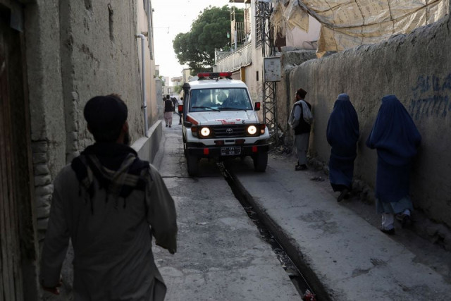 an ambulance is seen near the site of explosions at khalifa sahib mosque in kabul afghanistan april 29 2022 reuters an ambulance is seen near the site of explosions at khalifa sahib mosque in kabul afghanistan april 29 2022 reuters