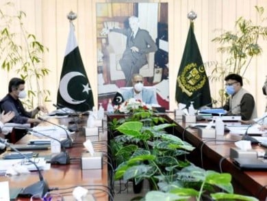 adviser to prime minister on finance and revenue dr abdul hafeez shaikh chairs ecnec meeting at the cabinet division in islamabad photo app