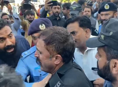 pti mna guard arrested as protests break out after imran s disqualification