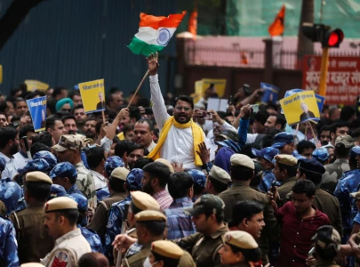 protests erupt in india after minister s arrest in liquor probe