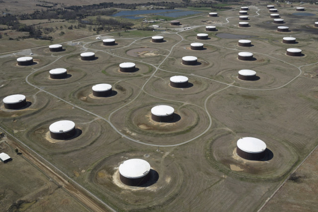 a weaker dollar also helped shore up oil prices photo reuters