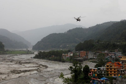 chinese indian workers among 11 killed in nepal floods 25 missing