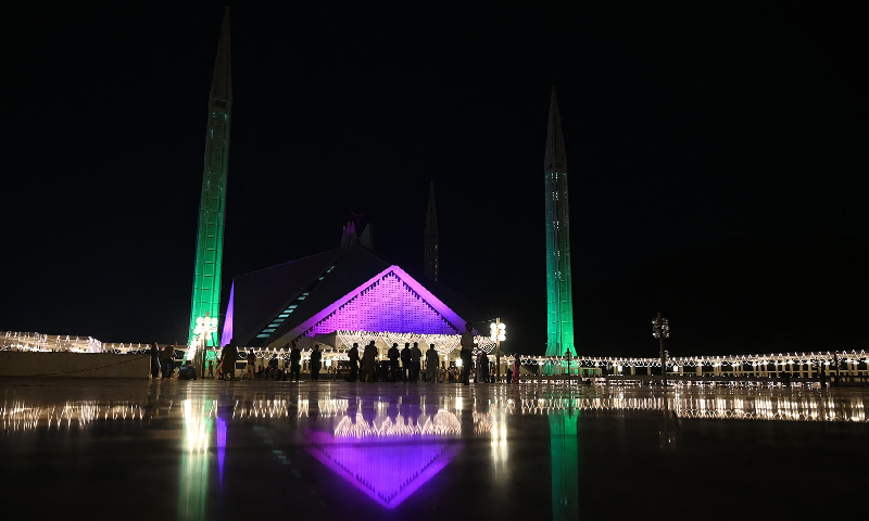 a photograph shows the illuminated faisal mosque building during celebrations marking eid miladun nabi in islamabad on october 18 photo afp