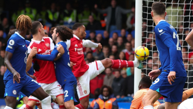 arsenal back on top salah double lifts liverpool