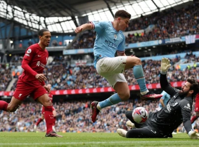 liverpool aim to storm city s etihad fortress