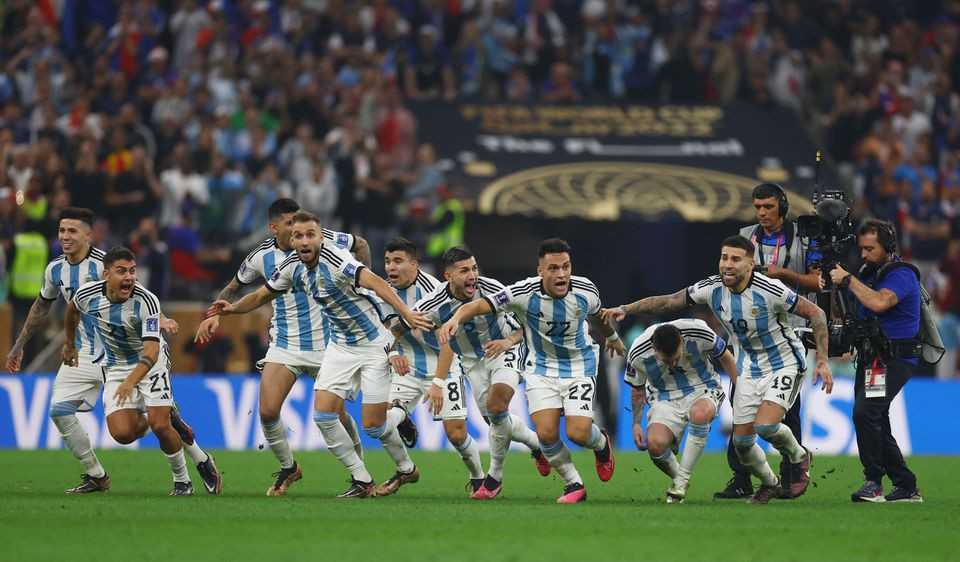 Argentina's Lionel Messi celebrates alongside Nicolas Otamendi, Lautaro Martinez and teammates after winning the World Cup. PHOTO: REUTERS