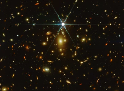 james webb telescope captures the most distant star in marvelous detail
