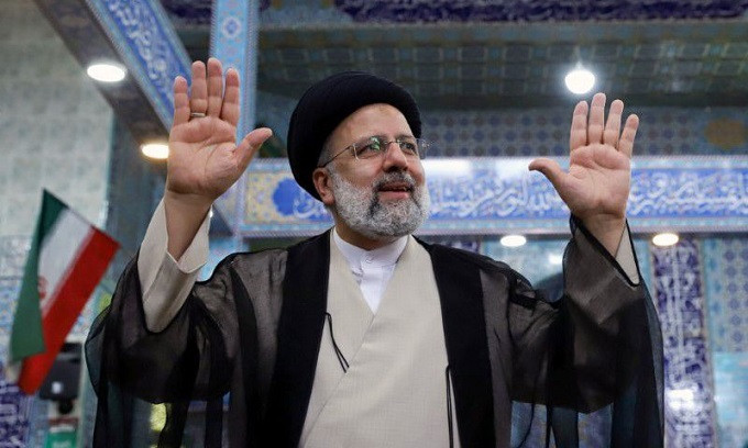 ebrahim raisi gestures after casting his vote during presidential elections at a polling station in tehran photo reuters