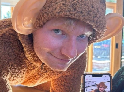 ed sheeran embraces ai inspired meme with monkey costume for halloween