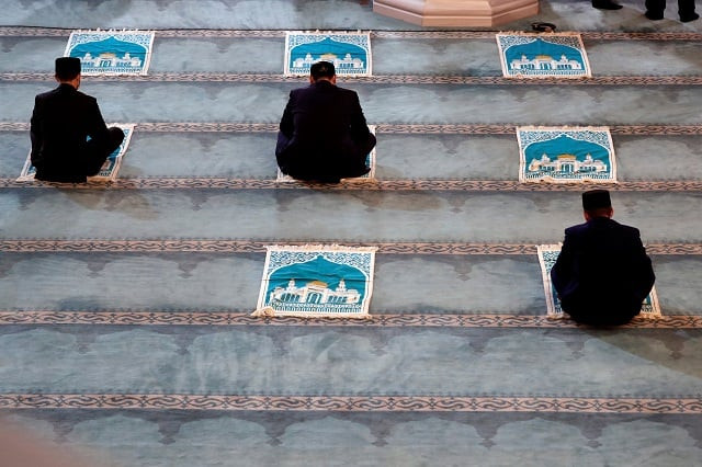 clergymen get ready for a prayer marking the muslim festival of eidul azha while maintaining social distance amid the coronavirus disease covid 19 outbreak in moscow s grand mosque in russia july 31 2020 photo reuters clergymen get ready for a prayer marking the muslim festival of eidul azha while maintaining social distance amid the coronavirus disease covid 19 outbreak in moscow s grand mosque in russia july 31 2020 photo reuters