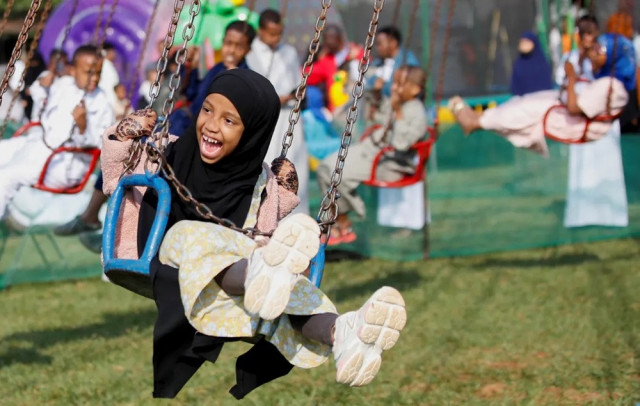 muslim children play after attending prayers at the sir ali muslim club ground in nairobi kenya photo reuters