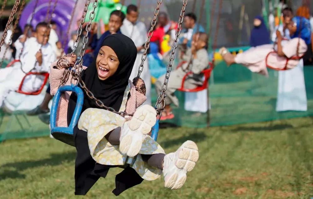 muslim children play after attending prayers at the sir ali muslim club ground in nairobi kenya photo reuters