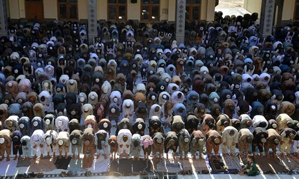 Muslim devotees offer Eidul Azha prayers at Hazrat-i-Omar mosque in Kandahar, Afghanistan on June 17. PHOTO: AFP
