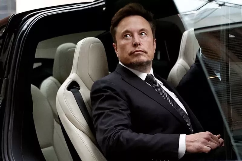 elon musk gets in a tesla car as he leaves a hotel in beijing may 31 2023 photo reuters elon musk gets in a tesla car as he leaves a hotel in beijing may 31 2023 photo reuters