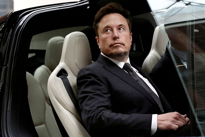 tesla chief executive officer elon musk gets in a tesla car as he leaves a hotel in beijing china may 31 2023 photo reuters