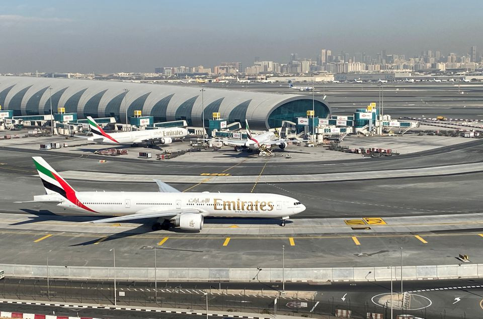 emirates airliners are seen on the tarmac in a general view of dubai international airport in dubai united arab emirates january 13 2021 photo reuters file