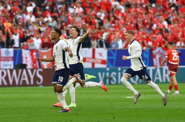 england s jude bellingham john stones and cole palmer celebrate after winning the penalty shootout photo reuters england s jude bellingham john stones and cole palmer celebrate after winning the penalty shootout photo reuters