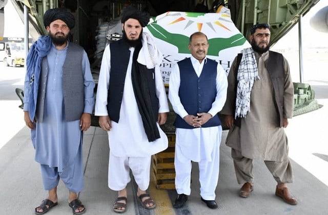 Ambassador Mansoor Ahmad Khan pictured at the delivery of the goods at the Hamid Karzai International Airport. PHOTO: APP