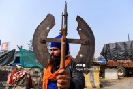 india s sword wielding sikh warriors guard protesting farmers