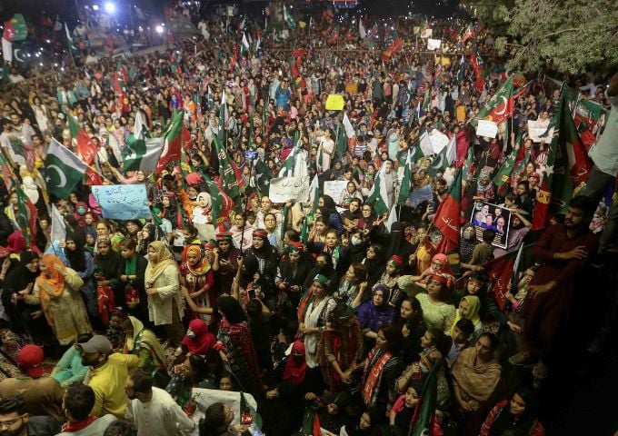 PTI supporters rally in support of former prime minister Imran Khan in Karachi on April 10. — Reuters