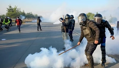 policemen fire tear gas shells to disperse supporters of pakistan tehreek e insaf pti party during a protest to demand the release of former prime minister imran khan in islamabad on november 26 2024 afp
