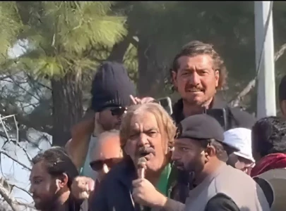 won t leave until imran khan orders us to k p cm gandapur