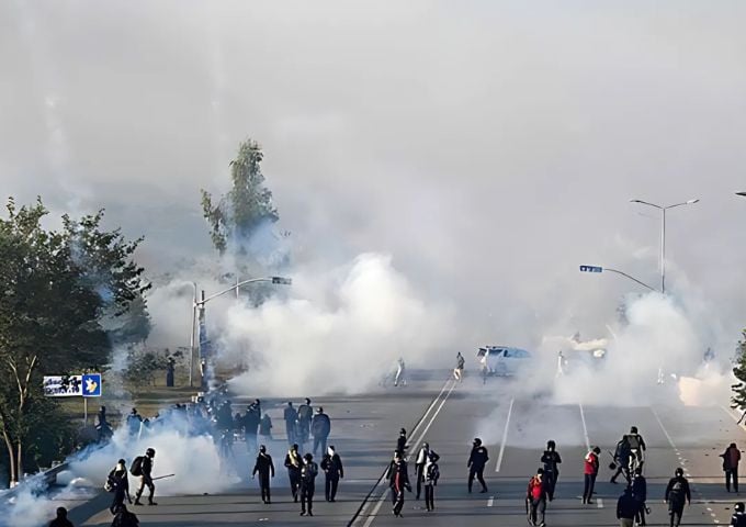 policemen fire tear gas shells to disperse supporters of pakistan tehreek e insaf pti party during a protest to demand the release of former prime minister imran khan in islamabad on november 26 2024 photo afp