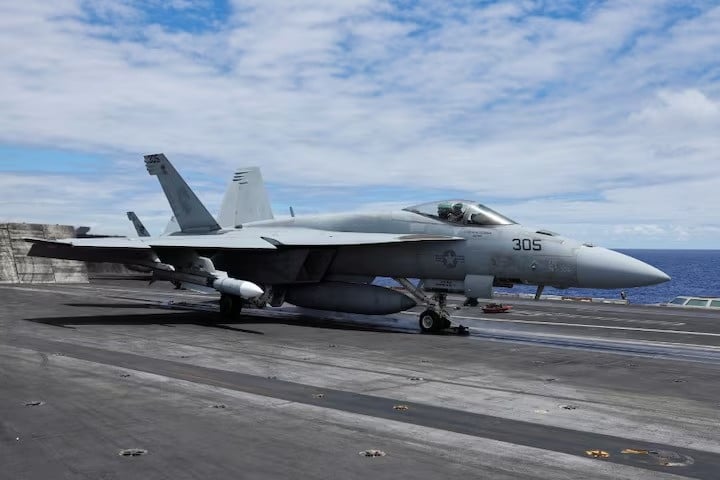 a f 18 jet launches off the uss carl vinson aircraft carrier during the rim of the pacific rimpac military exercises about 100 miles south of oahu hawaii us july 19 2024 photo reuters