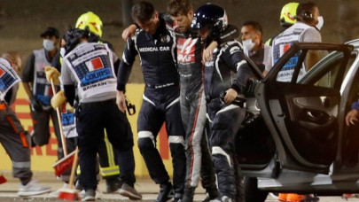 grosjean escapes fiery crash in bahrain hamilton wins