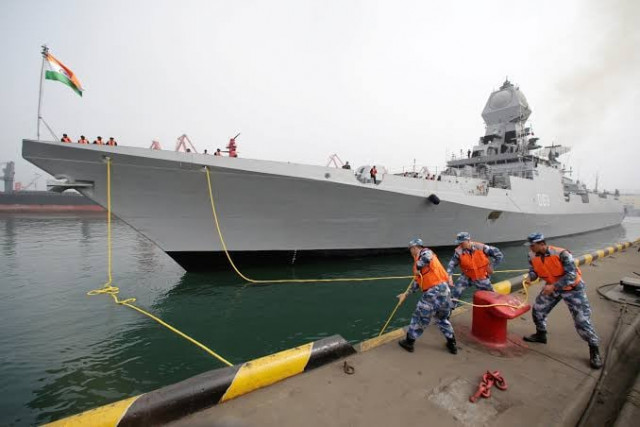 chinese navy personnel moor the indian navy warship ins kolkata at qingdao port for the 70th anniversary celebrations of the founding of the chinese people s liberation army navy plan in qingdao china april 21 2019 photo reuters chinese navy personnel moor the indian navy warship ins kolkata at qingdao port for the 70th anniversary celebrations of the founding of the chinese people s liberation army navy plan in qingdao china april 21 2019 photo reuters