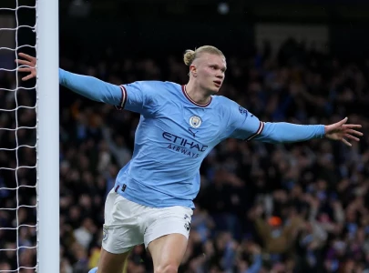 haaland puts man city on course for treble