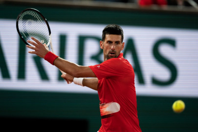 djokovic wins on slam return as nadal strolls