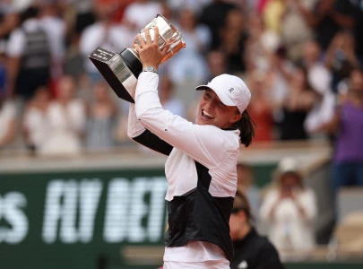 swiatek keeps lid on expectations