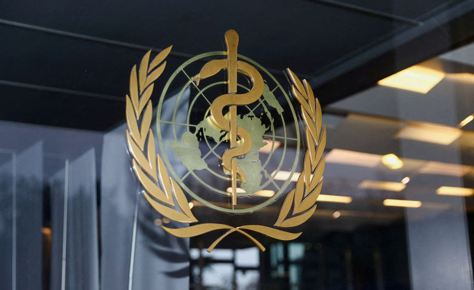 the world health organization logo is pictured at the entrance of the who building in geneva switzerland december 20 2021 photo reuters