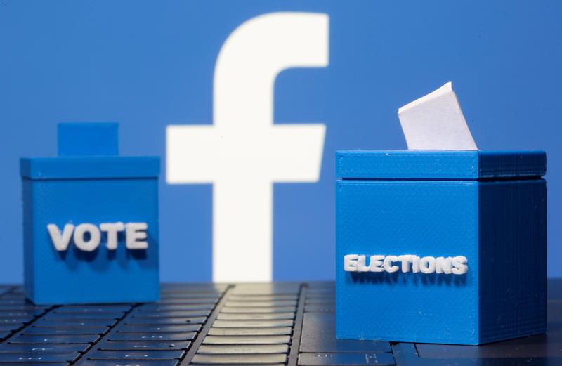 3d printed ballot boxes are seen in front of a displayed facebook logo in this illustration taken november 4 2020 photo reuters file