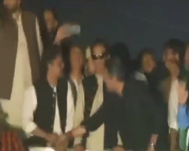 third time lucky hammad seen snatching mic from faisal in pti long march third time lucky hammad seen snatching mic from faisal in pti long march