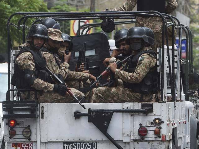 paramilitary soldiers on patrol near the pakistan stock exchange building following an attack photo afp