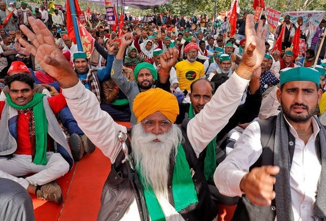 farmers shout slogans during a mass rally to demand minimum support prices be extended to all produce in lucknow india november 22 2021 photo reuters farmers shout slogans during a mass rally to demand minimum support prices be extended to all produce in lucknow india november 22 2021 photo reuters