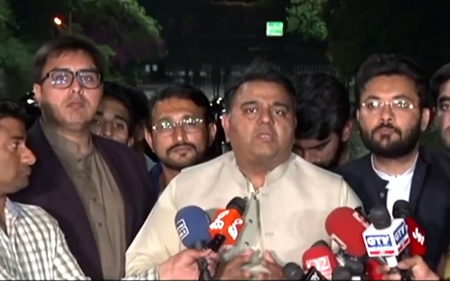 information minister fawad chaudhry r and special assistant to the prime minister for political communication dr shahbaz gill talk to media in islamabad on march 30 screengrab